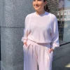 Pull licht rose lange mouw met witte bies | DELSCHER. Fashion