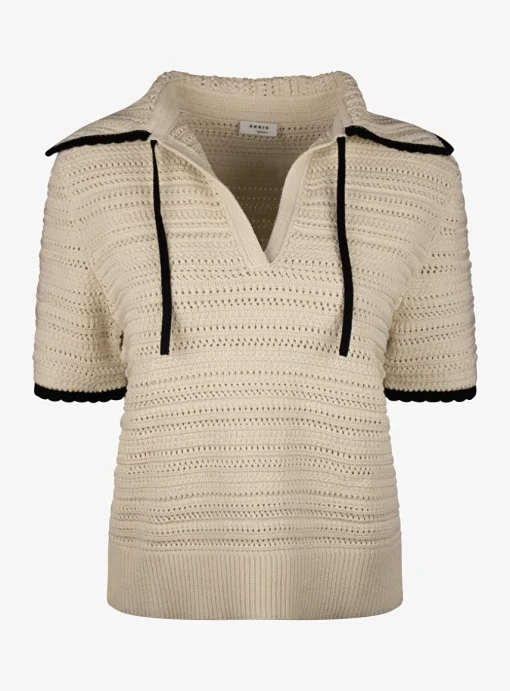 Pull polo beige met zwarte details | DELSCHER. Fashion