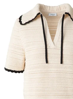 Pull polo beige met zwarte details | DELSCHER. Fashion