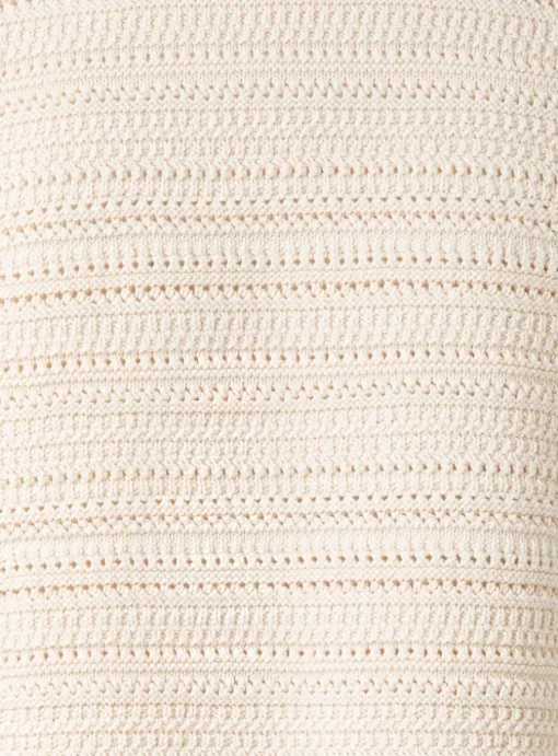 Pull polo beige met zwarte details | DELSCHER. Fashion