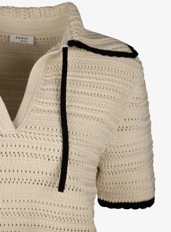 Pull polo beige met zwarte details | DELSCHER. Fashion