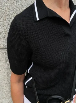 Pull polo zwart wit | DELSCHER. Fashion