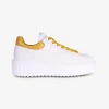 Sneakers H stripes wit geel | DELSCHER. Fashion