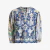 Top blauw dessin met borduur en broderie | DELSCHER. Fashion